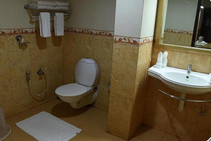 Hotel Sky Park Mattanur Екстериор снимка